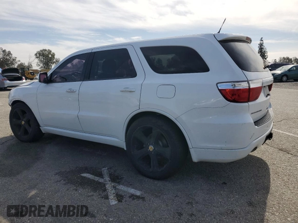 2013 Dodge Durango R/T with VIN 1C4SDHCT2DC559006, listed as a Copart auction lot 49275695 with 117,323 mi miles and Salvage title. Bid and sale history available at DreamBid. Image 2.