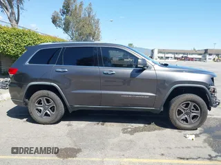 2014 Jeep Grand Cherokee Limited with VIN 1C4RJFBG5EC416620, listed as a IAAI auction lot 41967813 with 161,388 mi miles and . Bid and sale history available at DreamBid. Image 14.