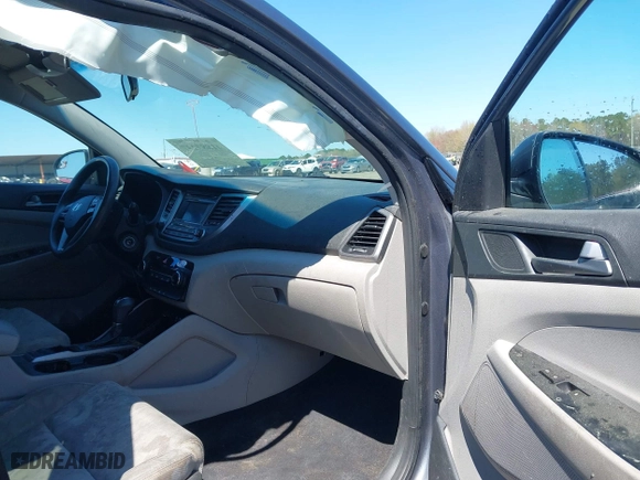 2017 Hyundai Tucson Value with VIN KM8J33A23HU405296, listed as a IAAI auction lot 41887237 with 114,027 mi miles. Bid and sale history available at carsss.com. Image 5.