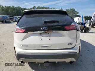 2019 Ford Edge SEL с VIN 2FMPK4J97KBB92236, выставлен на аукционе Copart как лот 61382775 с пробегом 67 162 миль миль и На запчасти • Non repairable. История ставок и продаж доступна на DreamBid. Изображение 6.