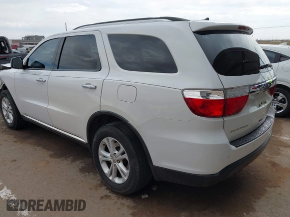 2013 Dodge Durango Crew with VIN 1C4RDHDG0DC535397, listed as a IAAI auction lot 41036306 with 163,571 mi miles. Bid and sale history available at carsss.com. Image 3.