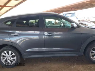 2021 Hyundai Tucson Value with VIN KM8J33A44MU403018, listed as a IAAI auction lot 42074597 with 63,654 mi miles and . Bid and sale history available at DreamBid. Image 14.