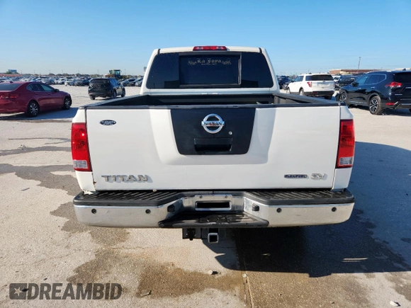 2012 Nissan Titan SV with VIN 1N6BA0ED2CN319597, listed as a Copart auction lot 62016445 with 169,120 mi miles and Salvage title. Bid and sale history available at DreamBid. Image 6.