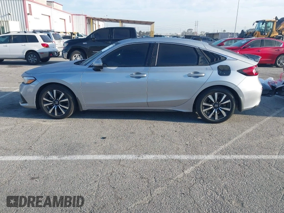 2024 Honda Civic EX-L z VIN 19XFL1H70RE022707, wystawiony jako IAAI lot #41852356 z przebiegiem 23 137 mil mil oraz . Historia ofert i sprzedaży dostępna na DreamBid. Obrazek 14.