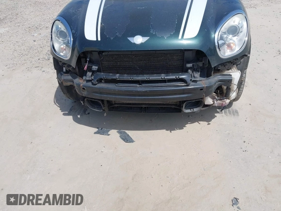 2012 MINI Countryman S z VIN WMWZC3C5XCWM26655, wystawiony jako IAAI lot #42083045 z przebiegiem 156 558 mil mil oraz . Historia ofert i sprzedaży dostępna na DreamBid. Obrazek 6.