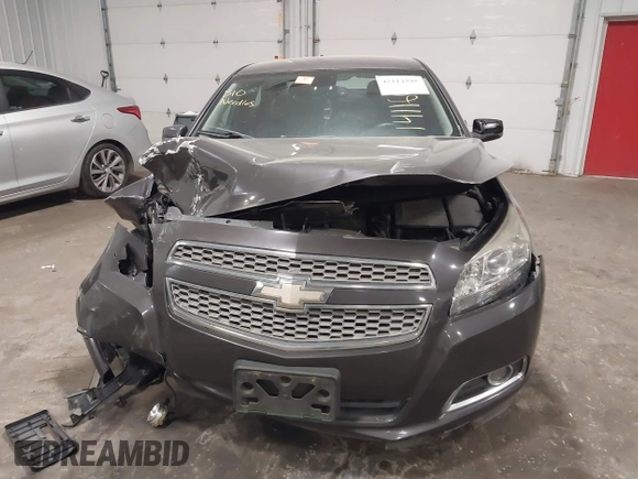 2013 Chevrolet Malibu LTZ with VIN 1G11H5SA1DF281933, listed as a IAAI auction lot 42114395 with 193,550 mi miles and . Bid and sale history available at DreamBid. Image 12.