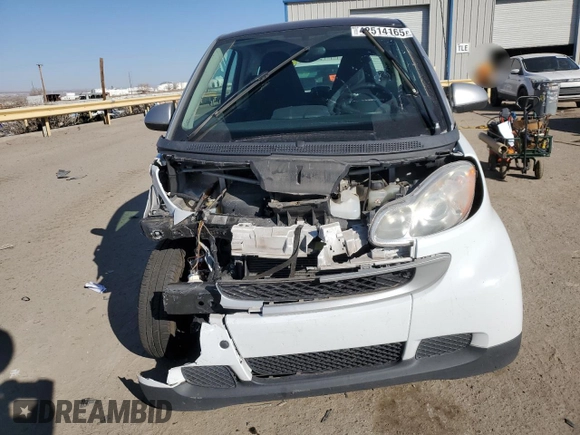 2010 Smart fortwo Pure with VIN WMEEJ3BA4AK341838, listed as a Copart auction lot 42514165 with 86,418 mi miles and Salvage title. Bid and sale history available at DreamBid. Image 5.