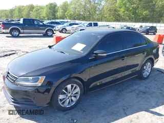 2015 Volkswagen Jetta SE with VIN 3VWD17AJ3FM301301, listed as a IAAI auction lot 41998475 with 98,407 mi miles and . Bid and sale history available at DreamBid. Image 2.