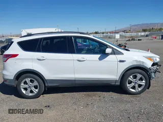2016 Ford Escape SE with VIN 1FMCU9G95GUC63027, listed as a IAAI auction lot 41838955 with 95,283 mi miles. Bid and sale history available at carsss.com. Image 14.