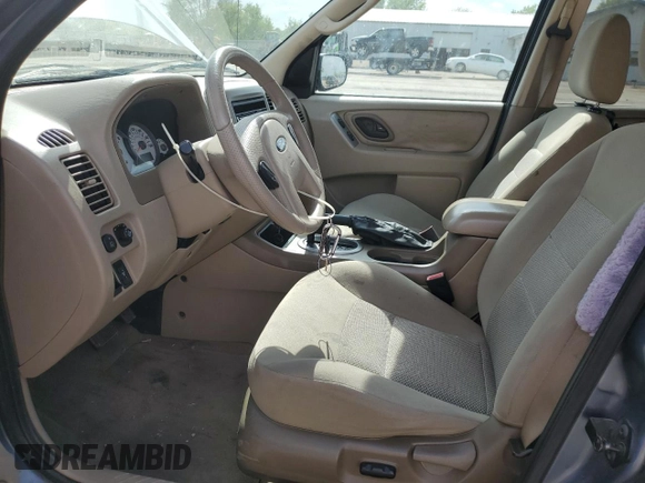 2006 Ford Escape XLT with VIN 1FMCU03196KA23467, listed as a Copart auction lot 56059295 with 162,314 mi miles and Salvage title. Bid and sale history available at DreamBid. Image 7.