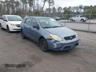 2004 Toyota Matrix Std with VIN 2T1KR32EX4C198669, listed as a IAAI auction lot 41411157 with 136,196 mi miles. Bid and sale history available at carsss.com. Image 1.