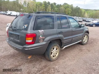 2004 Jeep Grand Cherokee Laredo with VIN 1J4GX48S14C176318, listed as a IAAI auction lot 41887810 with 1 mi miles. Bid and sale history available at carsss.com. Image 4.