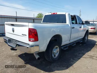 2013 Ram 2500 Tradesman z VIN 3C6UR5CL4DG529793, wystawiony jako IAAI lot #42029361 z przebiegiem 205 066 mil mil oraz . Historia ofert i sprzedaży dostępna na DreamBid. Obrazek 4.