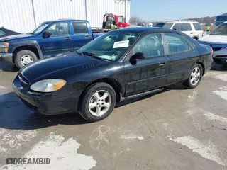 2003 Ford Taurus SE Standard with VIN 1FAFP53U23G219786, listed as a IAAI auction lot 41799874 with 172,128 mi miles. Bid and sale history available at carsss.com. Image 2.