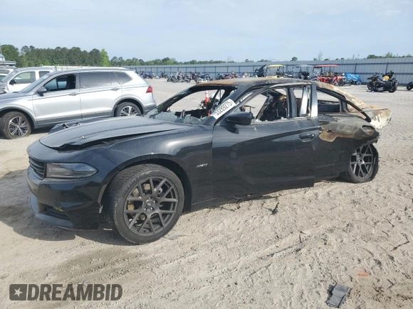2018 Dodge Charger R/T z VIN 2C3CDXCT2JH147082, wystawiony jako Copart lot #53289275 z przebiegiem Nie podano mil oraz Szkoda całkowita • Salvage title. Historia ofert i sprzedaży dostępna na DreamBid. Obrazek 1.
