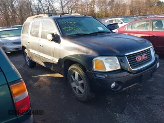 2005 GMC Envoy XL SLE with VIN 1GKET16SX56139511, listed as a IAAI auction lot 41234171 with 999,999 mi miles. Bid and sale history available at carsss.com. Image 1.