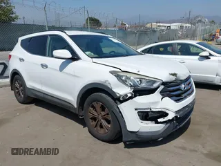2014 Hyundai Santa Fe with VIN 5XYZU3LB9EG191896, listed as a IAAI auction lot 42531580 with 125,803 mi miles and . Bid and sale history available at DreamBid. Image 1.