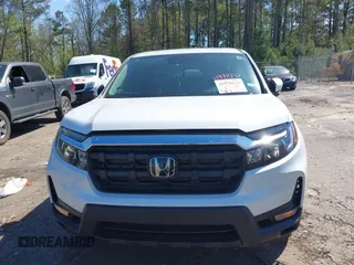 2024 Honda Ridgeline RTL z VIN 5FPYK3F54RB026656, wystawiony jako IAAI lot #41878732 z przebiegiem 15 585 mil mil oraz . Historia ofert i sprzedaży dostępna na DreamBid. Obrazek 12.