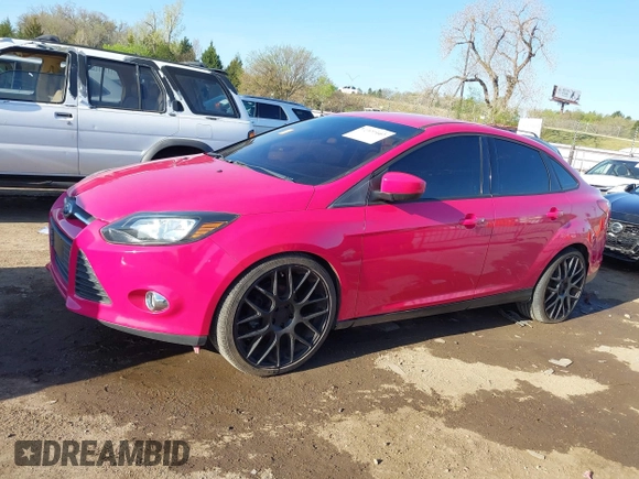 2012 Ford Focus SE with VIN 1FAHP3F2XCL211644, listed as a IAAI auction lot 41977107 with 142,271 mi miles and . Bid and sale history available at DreamBid. Image 14.
