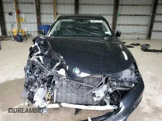 2019 BMW 7 Series 740i z VIN WBA7E2C57KB454012, wystawiony jako Copart lot #50977775 z przebiegiem Nie podano mil oraz Szkoda całkowita • Salvage title. Historia ofert i sprzedaży dostępna na DreamBid. Obrazek 5.