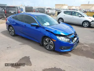 2018 Honda Civic EX-T z VIN JHMFC1F31JX018152, wystawiony jako IAAI lot #41935394 z przebiegiem 60 333 mil mil oraz . Historia ofert i sprzedaży dostępna na DreamBid. Obrazek 1.