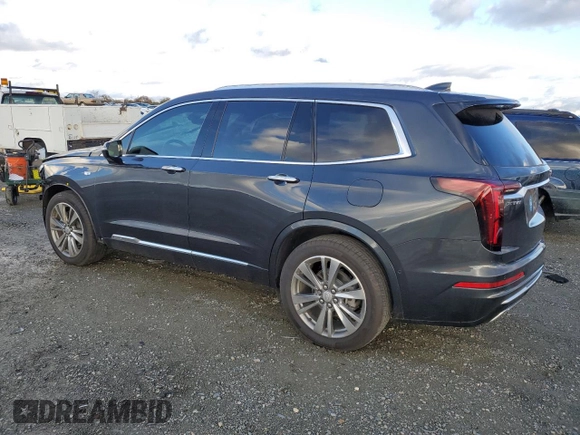 2021 Cadillac XT6 Premium Luxury with VIN 1GYKPERS3MZ150928, listed as a Copart auction lot 86551144 with 12,311 mi miles and Salvage title. Bid and sale history available at DreamBid. Image 2.