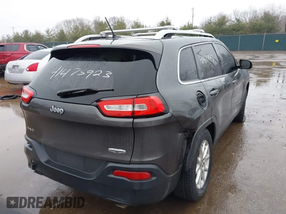 2014 Jeep Cherokee Latitude z VIN 1C4PJMCS5EW137875, wystawiony jako IAAI lot #41475923 z przebiegiem 124 565 mil mil oraz . Historia ofert i sprzedaży dostępna na DreamBid. Obrazek 4.
