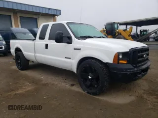 2005 Ford Super Duty F-250 XL with VIN 1FTSX20P85EB90248, listed as a Copart auction lot 72090224 with 214,818 mi miles and Salvage Title. Bid and sale history available at carsss.com. Image 4.