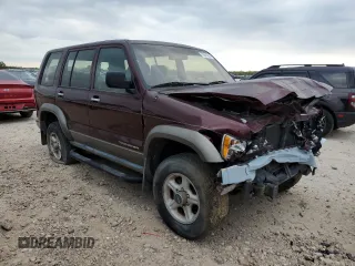 2000 Isuzu Trooper S с VIN JACDJ58X3Y7J09857, выставлен на аукционе Copart как лот 79924354 с пробегом Не указан миль и Чистый • Clean title. История ставок и продаж доступна на DreamBid. Изображение 4.