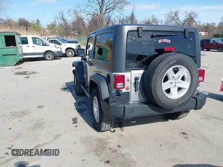 2015 Jeep Wrangler Sport with VIN 1C4GJWAG0FL503254, listed as a IAAI auction lot 41931666 with 115,394 mi miles. Bid and sale history available at carsss.com. Image 3.