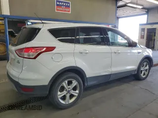 2016 Ford Escape SE с VIN 1FMCU9GX8GUA99979, выставлен на аукционе Copart как лот 57623295 с пробегом 124 813 миль миль и Списание • Salvage title. История ставок и продаж доступна на DreamBid. Изображение 3.