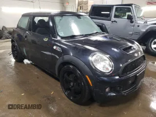 2007 MINI Hardtop S with VIN WMWMF73547TL90560, listed as a Copart auction lot 42565685 with 57,066 mi miles and Salvage Title. Bid and sale history available at DreamBid. Image 4.