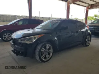 2013 Hyundai Veloster w/Gray Int z VIN KMHTC6AD8DU163465, wystawiony jako Copart lot #60276915 z przebiegiem 124 451 mil mil oraz Szkoda całkowita • Salvage title. Historia ofert i sprzedaży dostępna na DreamBid. Obrazek 1.