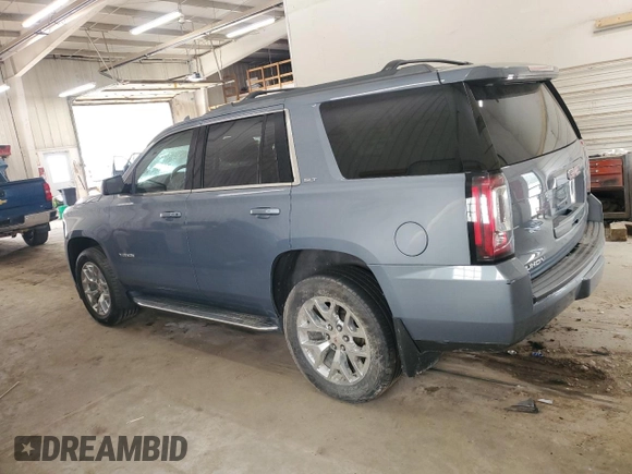 2015 GMC Yukon SLT z VIN 1GKS2BKC0FR630731, wystawiony jako Copart lot #55359445 z przebiegiem Nie podano mil oraz Szkoda całkowita • Salvage title. Historia ofert i sprzedaży dostępna na DreamBid. Obrazek 2.