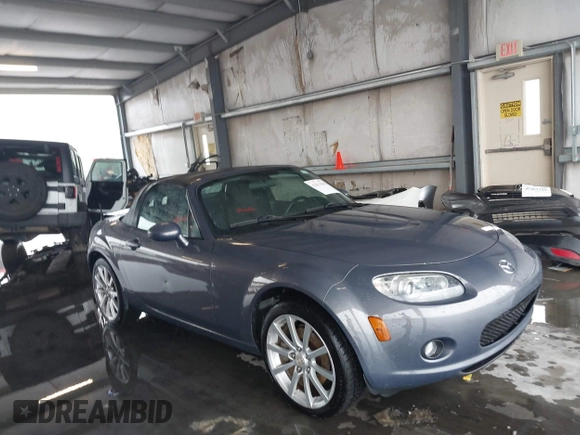 2006 Mazda MX-5 Miata Sport с VIN JM1NC25F560110444, выставлен на аукционе IAAI как лот 42611844 с пробегом 58 309 миль миль и . История ставок и продаж доступна на DreamBid. Изображение 1.