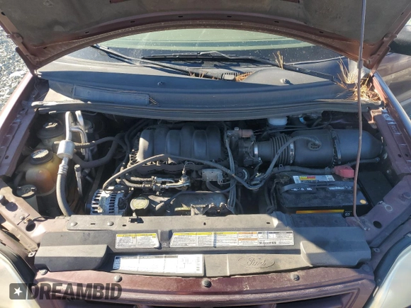 2000 Ford Windstar LX z VIN 2FMZA5145YBA32743, wystawiony jako Copart lot #41564265 z przebiegiem 139 713 mil mil oraz Szkoda całkowita • Salvage title. Historia ofert i sprzedaży dostępna na DreamBid. Obrazek 12.