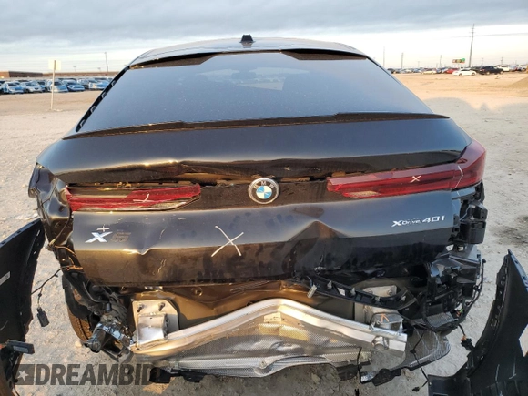 2025 BMW X6 xDrive40i with VIN 5UX33EX09S9Y26463, listed as a Copart auction lot 84269334 with 1,970 mi miles and Salvage Title. Bid and sale history available at carsss.com. Image 6.