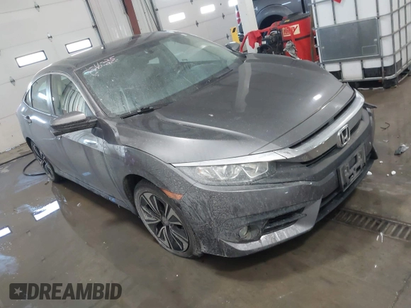 2018 Honda Civic EX-T with VIN JHMFC1F35JX031132, listed as a IAAI auction lot 41591028 with 111,087 mi miles and . Bid and sale history available at DreamBid. Image 1.