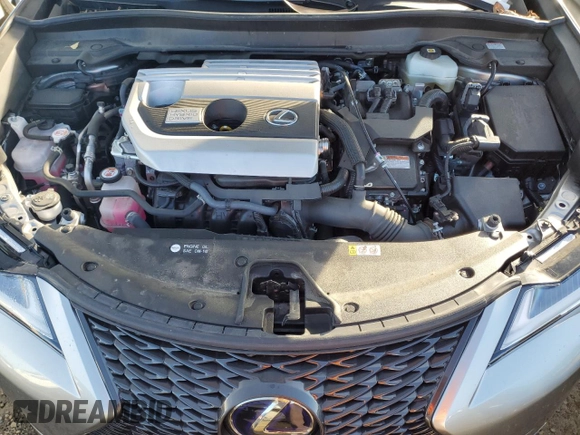 2021 Lexus UX with VIN JTHE9JBH3M2050145, listed as a Copart auction lot 86389664 with 24,937 mi miles and Salvage Title. Bid and sale history available at carsss.com. Image 12.