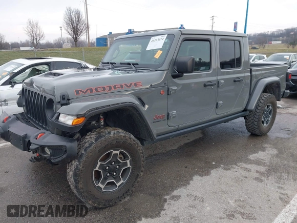 2022 Jeep Gladiator Mojave z VIN 1C6JJTEG8NL130971, wystawiony jako IAAI lot #41163074 z przebiegiem 47 142 mil mil oraz . Historia ofert i sprzedaży dostępna na DreamBid. Obrazek 2.