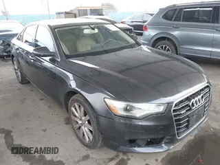 2014 Audi A6 Premium Plus z VIN WAUGFAFC7EN025053, wystawiony jako IAAI lot #42131033 z przebiegiem 154 552 mil mil oraz . Historia ofert i sprzedaży dostępna na DreamBid. Obrazek 1.