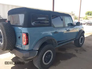 2022 Ford Bronco with VIN 1FMEE5DP9NLB61055, listed as a IAAI auction lot 42359888 with 70,668 mi miles and . Bid and sale history available at DreamBid. Image 4.