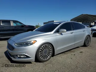 2017 Ford Fusion Titanium z VIN 3FA6P0K9XHR124246, wystawiony jako Copart lot #59497285 z przebiegiem 198 503 mil mil oraz Szkoda całkowita • Salvage title. Historia ofert i sprzedaży dostępna na DreamBid. Obrazek 1.