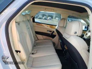 2019 Bentley Bentayga V8 z VIN SJAAM2ZV9KC026988, wystawiony jako Copart lot #73576964 z przebiegiem 31 162 mil mil oraz Szkoda całkowita • Salvage title. Historia ofert i sprzedaży dostępna na DreamBid. Obrazek 11.