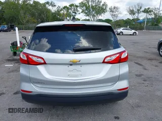 2020 Chevrolet Equinox LS z VIN 3GNAXHEV8LS696940, wystawiony jako IAAI lot #42153761 z przebiegiem 60 309 mil mil oraz . Historia ofert i sprzedaży dostępna na DreamBid. Obrazek 16.