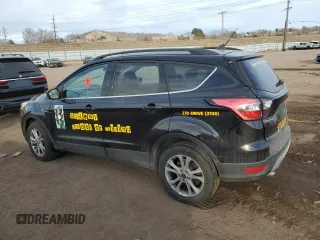 2018 Ford Escape SE z VIN 1FMCU9GDXJUD21466, wystawiony jako Copart lot #46266395 z przebiegiem Nie podano mil oraz Szkoda całkowita • Salvage title. Historia ofert i sprzedaży dostępna na DreamBid. Obrazek 2.