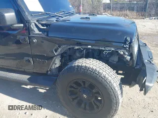 2018 Jeep Wrangler Unlimited Sahara z VIN 1C4HJXEG9JW216717, wystawiony jako IAAI lot #40908017 z przebiegiem 87 954 mil mil oraz . Historia ofert i sprzedaży dostępna na DreamBid. Obrazek 6.
