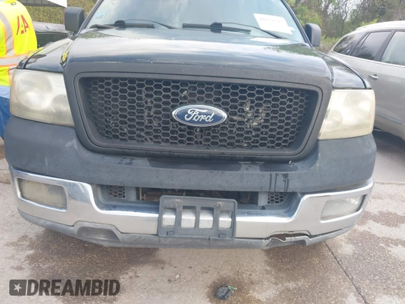 2004 Ford F-150 XL with VIN 1FTRF12W74NC53337, listed as a IAAI auction lot 41859392 with 219,829 mi miles. Bid and sale history available at carsss.com. Image 6.