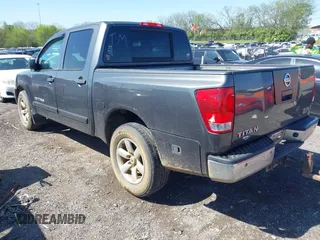 2012 Nissan Titan SV with VIN 1N6AA0EDXCN325756, listed as a IAAI auction lot 42025837 with 218,658 mi miles. Bid and sale history available at carsss.com. Image 3.