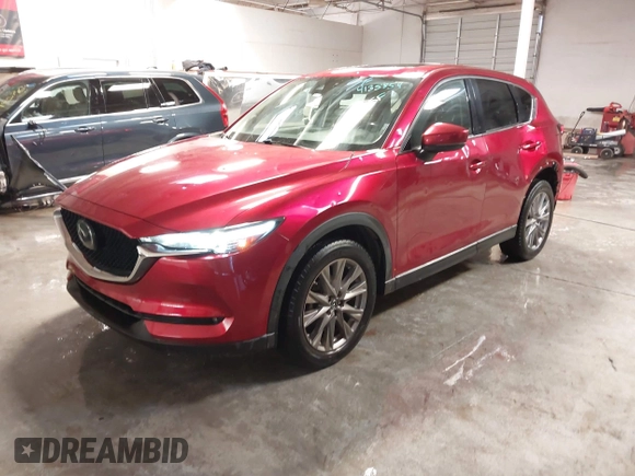 2020 Mazda CX-5 Grand Touring with VIN JM3KFBDM1L1809951, listed as a IAAI auction lot 41345854 with 117,376 mi miles. Bid and sale history available at carsss.com. Image 18.
